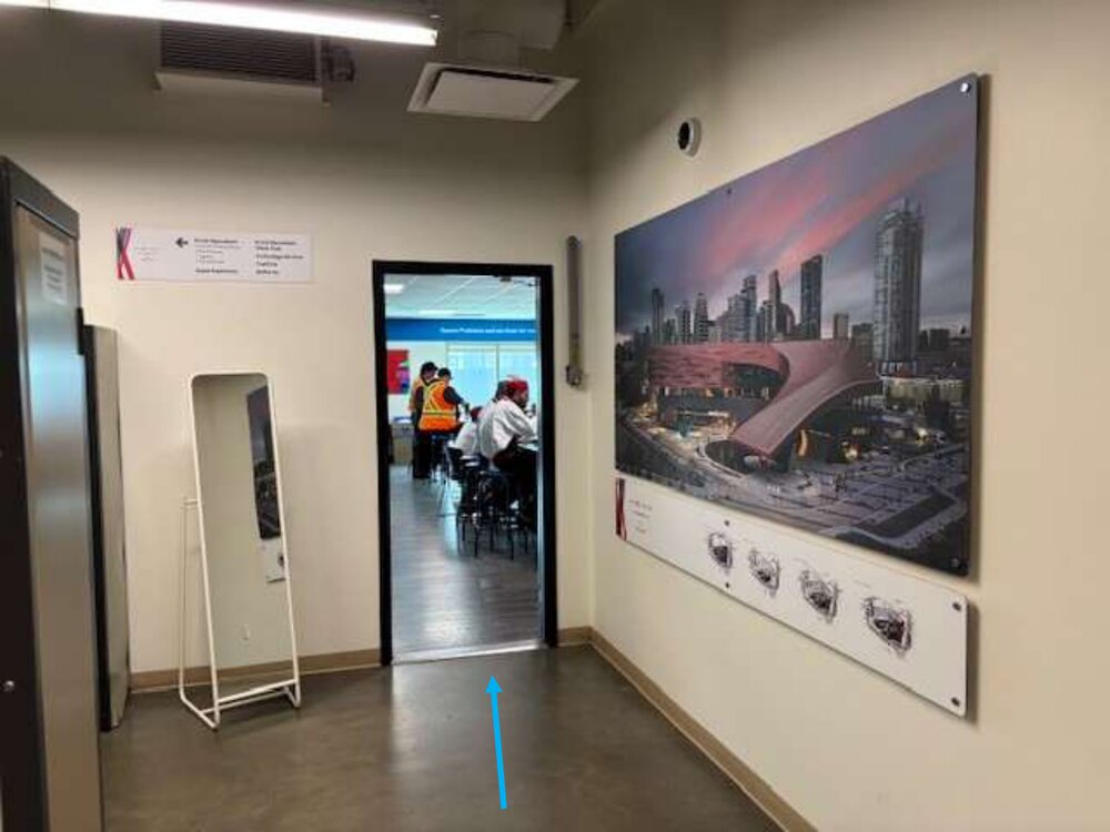 The Staff Lunchroom doorway on Level 2M with staff seated inside.
